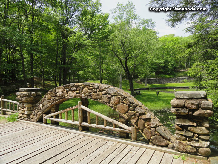 Gillette Castle State Park hand made brick bridge over seasonal low stream