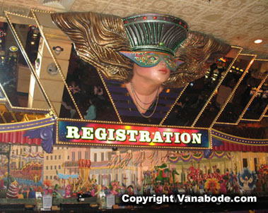 orleans registration desk with huge mardi gras facades
