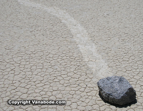 picture of rock that slide on dry lake bed at the racetrack in death valley